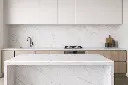 Calacatta Vento surface — Guava Quartz + Stone | Adam Stonetech (view 1)