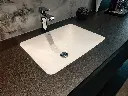 Absolute Black surface — Guava Quartz + Stone | Adam Stonetech (view 1)
